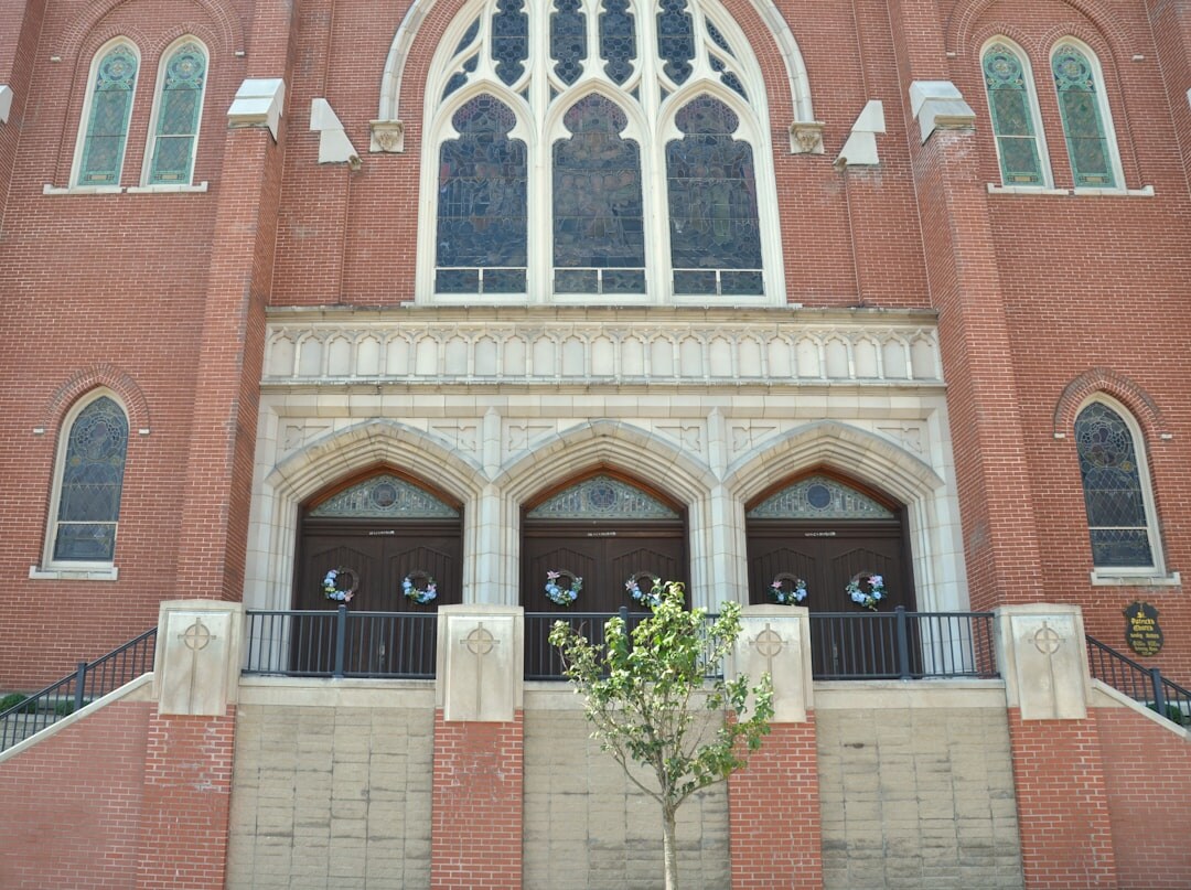 Welcoming entrance of a neighborhood community center building with flower boxes