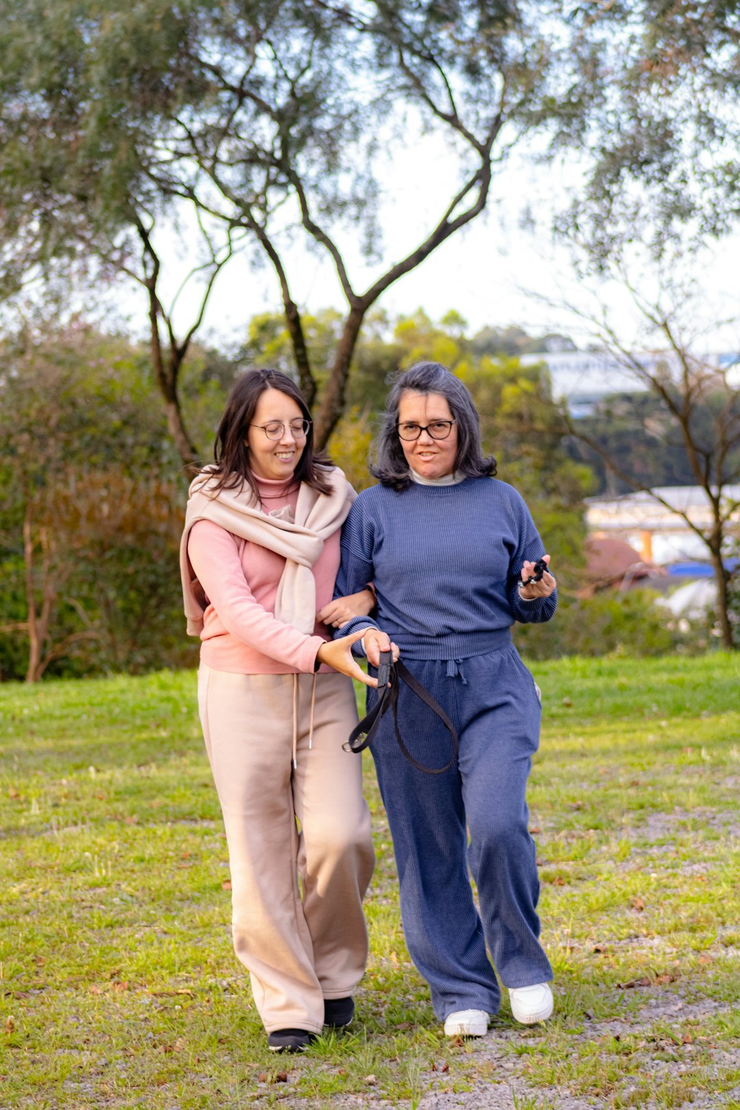 senior couple walking in park