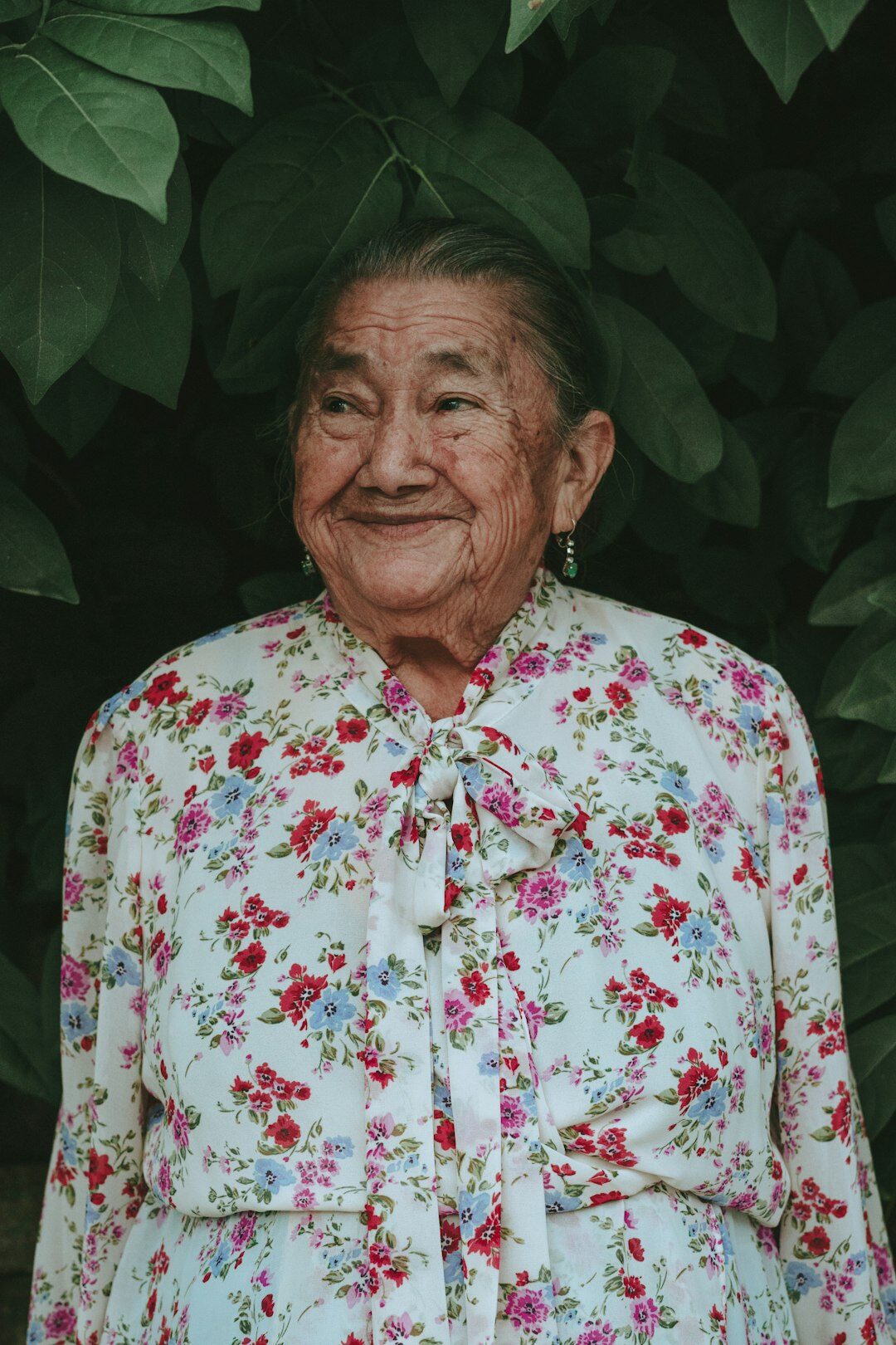 Portrait of a smiling elderly Swiss woman with short white hair