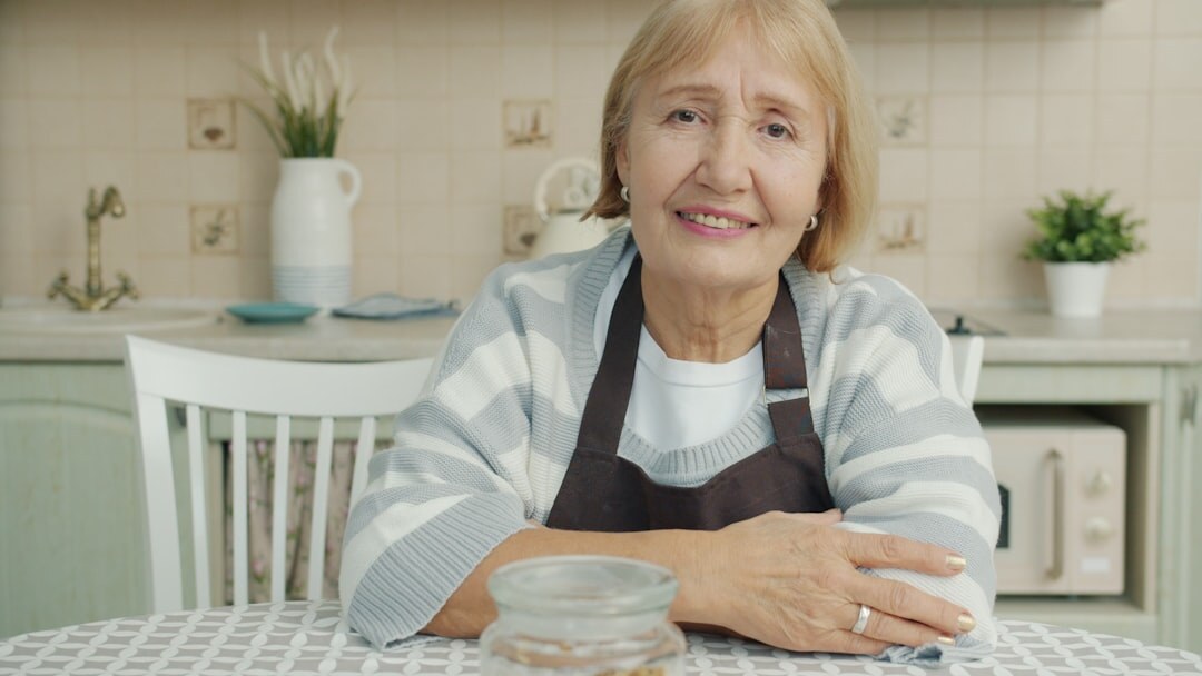Portrait of a cheerful elderly Swiss woman wearing a scarf