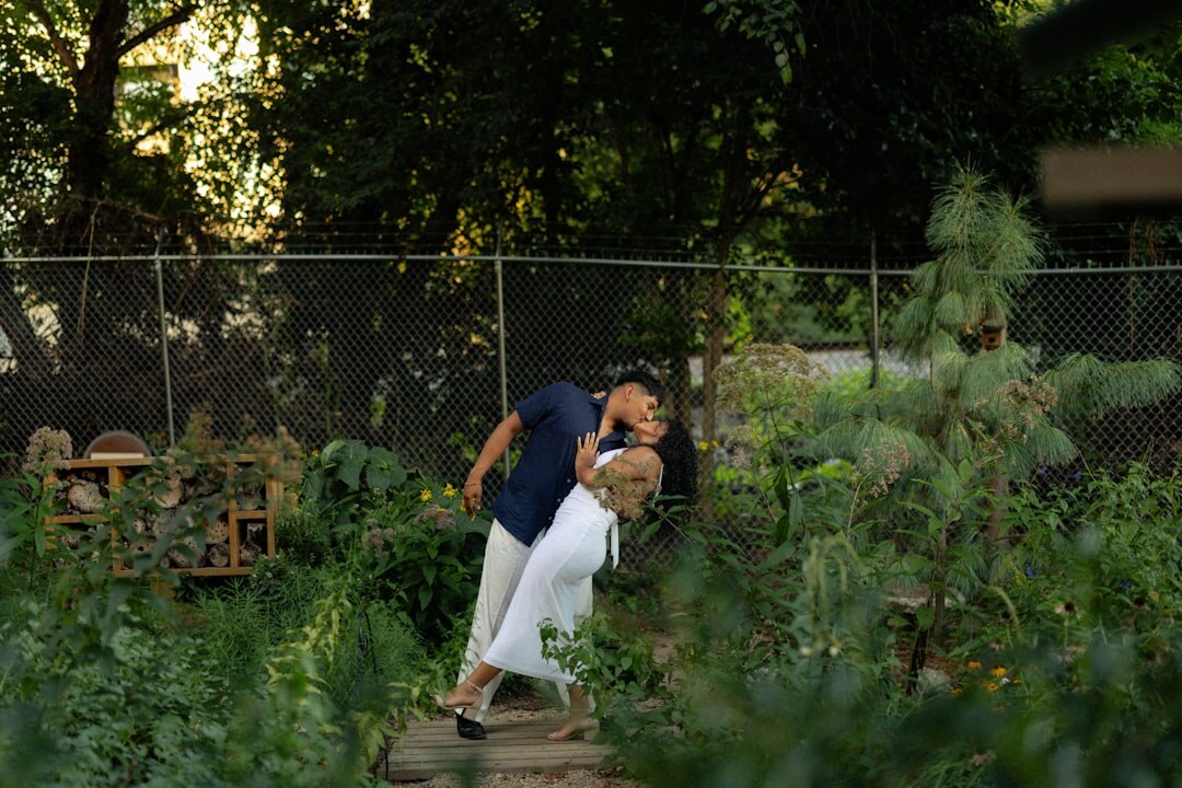 senior couple smiling in garden