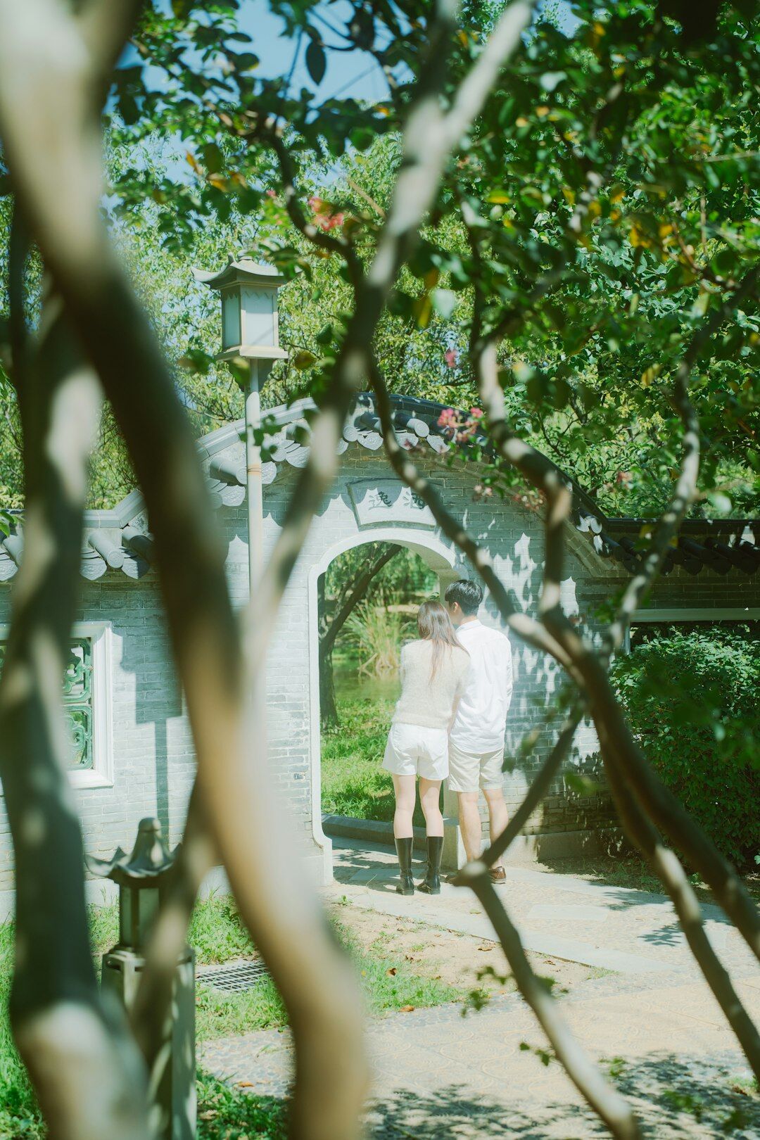 senior couple smiling in garden