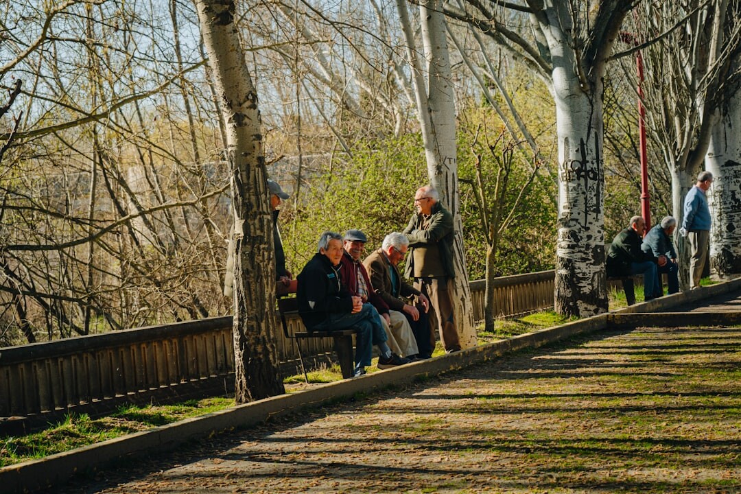 senior group walking in park
