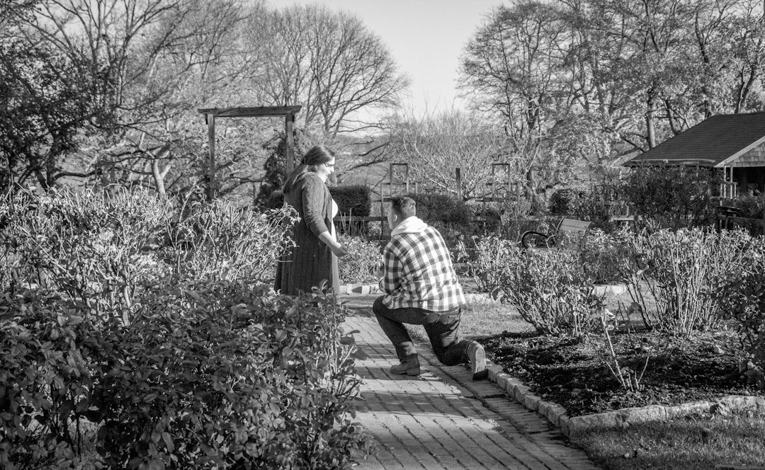 senior couple smiling in garden